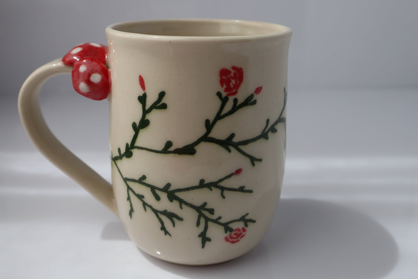 Ceramic mug with a fairy design on a white background